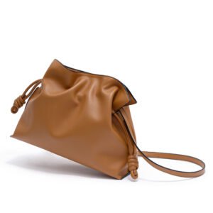 side of Drawstring Leather Crossbody Bag Brown