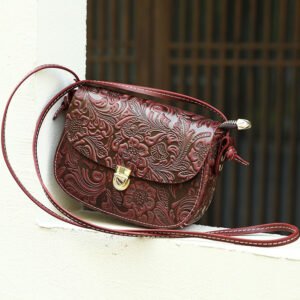 Floral Embossed Leather Small Crossbody Bag red on the window