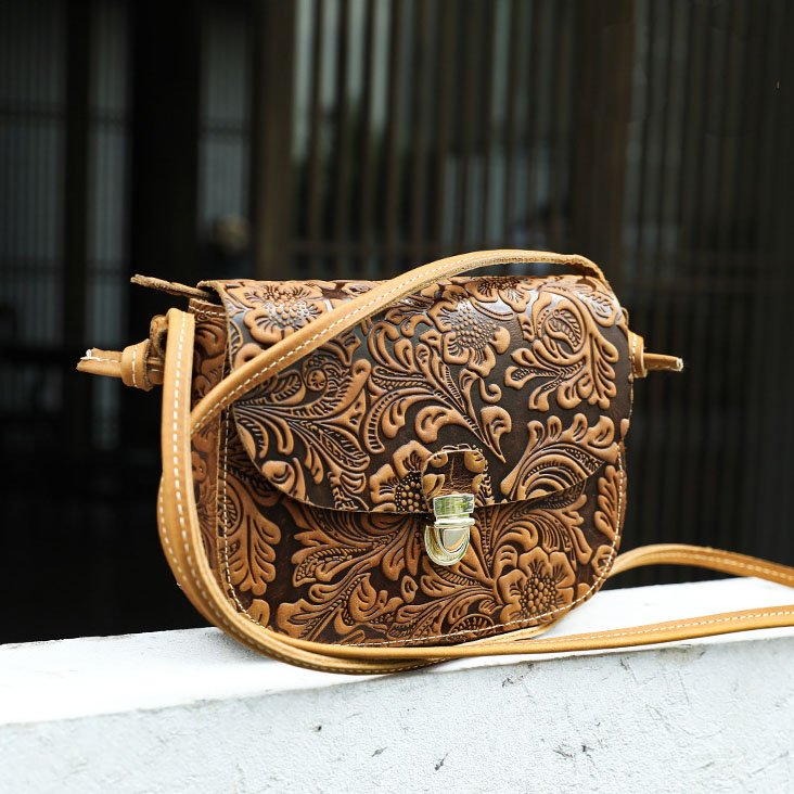 right side of Floral Embossed Leather Small Crossbody Bag Tan