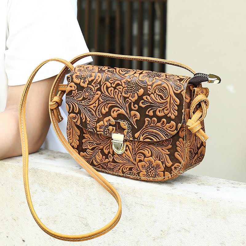 left side of Floral Embossed Leather Small Crossbody Bag Tan