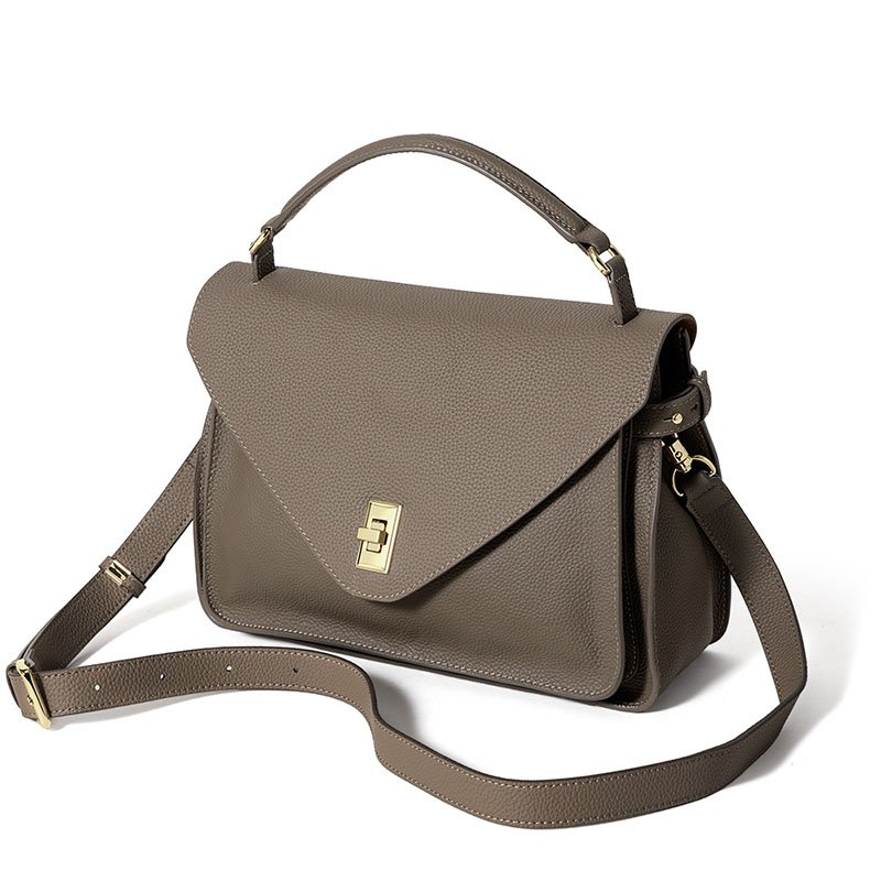 long strap of Togo Leather Top Handle Crossbody Bag Taupe