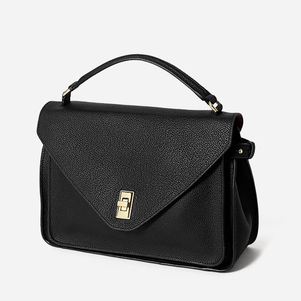 side of Togo Leather Top Handle Crossbody Bag Black
