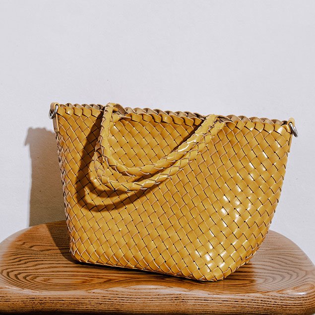 side of Woven Leather Small Tote Bag with Braid Handle mustard