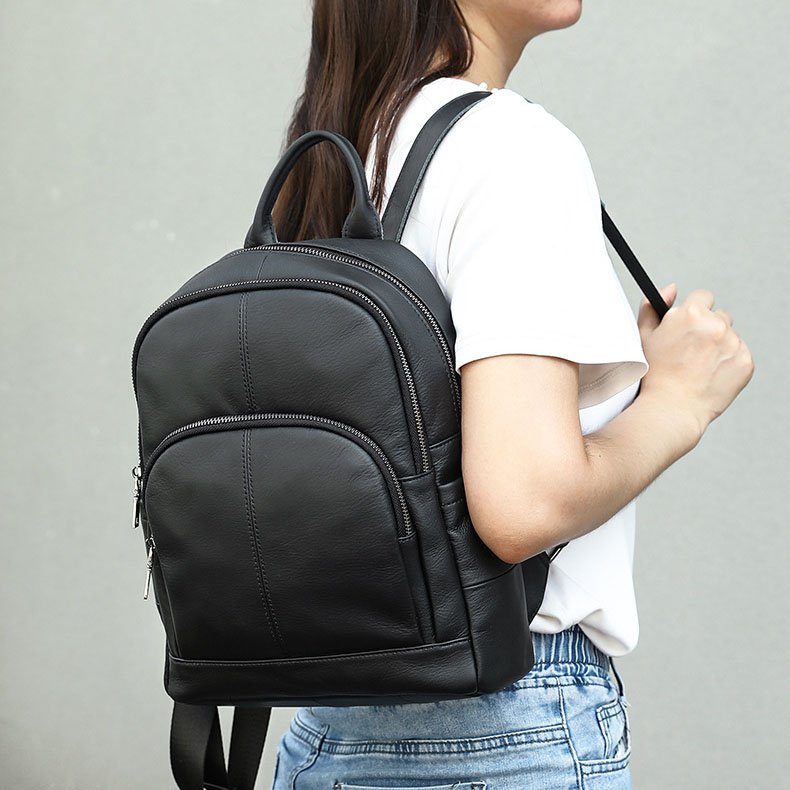Black Leather Backpack for Women carrying on shoulder