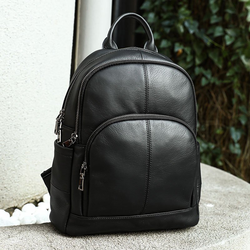 Black Leather Backpack for Women on the floor