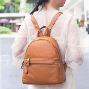 Grain Leather Medium Backpack with Multi Pockets Brown carrying on a woman's back